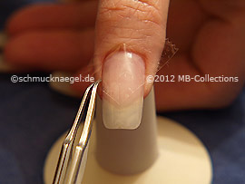 Clear adhesive tape and tweezers