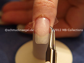 Clear adhesive tape and tweezers