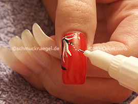 nail art pen in the colour white, clear nail polish and strass stones