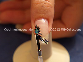 The clear nail lacquer protects the nail art