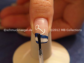 The clear nail lacquer protects the nail art