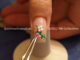 flower sticker and tweezers