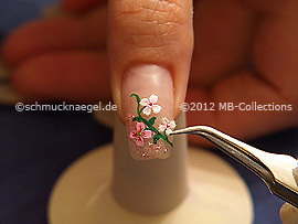 flower sticker and tweezers