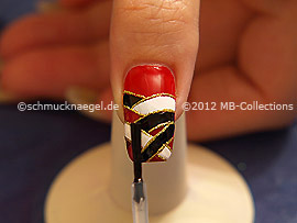 The clear nail lacquer protects the nail art