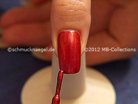 Nail lacquer in the colour dark red