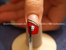 The clear nail lacquer protects the nail art