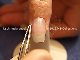 Clear adhesive tape and tweezers