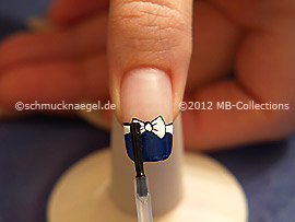 The clear nail lacquer protects the nail art
