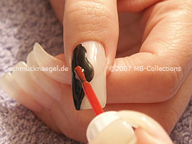nail art pens in the colours red, white, silver and bronze