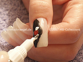 nail art pens in the colours red, white, silver and bronze