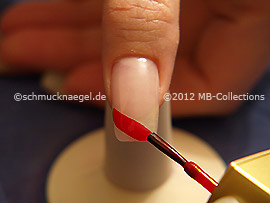 Nail lacquer in the colour red