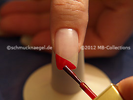 Nail lacquer in the colour red