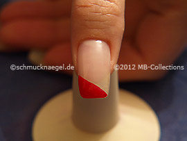 Nail lacquer in the colour red