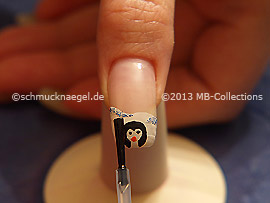 The clear nail lacquer protects the nail art