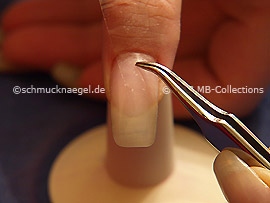 Clear adhesive tape and tweezers