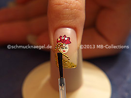 The clear nail lacquer protects the nail art