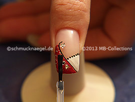 The clear nail lacquer protects the nail art