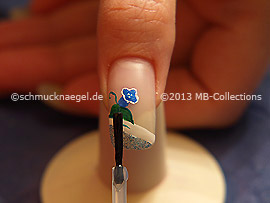 The clear nail lacquer protects the nail art