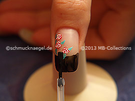The clear nail lacquer protects the nail art