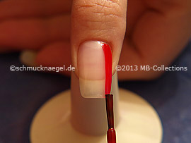 Nail lacquer in the colour red