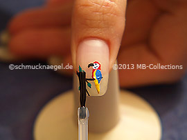 The clear nail lacquer protects the nail art