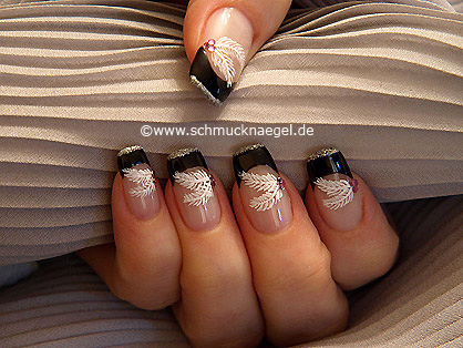 Feather nail art motif with strass stones