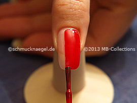 Nail lacquer in the colour red