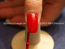 Nail lacquer in the colour red