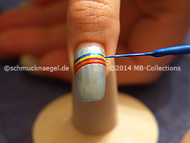 Nail art liner in the colours red, orange, fuchsia, yellow and blue