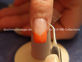 Tweezers and clear adhesive tape