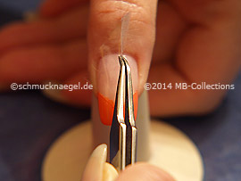 Tweezers and clear adhesive tape