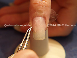 Clear adhesive tape and tweezers