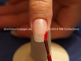 Nail lacquer in the colour red