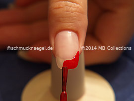 Nail lacquer in the colour red