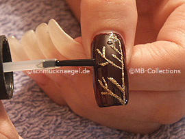 clear nail polish, spot-swirl or toothpick and strass stones in crystal