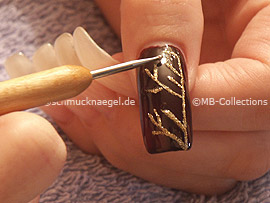 clear nail polish, spot-swirl or toothpick and strass stones in crystal