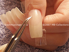 tweezers and clear adhesive tape