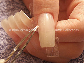 tweezers and clear adhesive tape