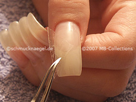 cutter, tweezers and clear adhesive tape