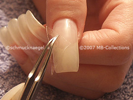 cutter, tweezers and clear adhesive tape