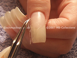 cutter, tweezers and clear adhesive tape