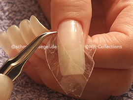 clear adhesive tape, cutter and tweezers