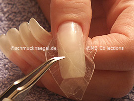 clear adhesive tape, cutter and tweezers