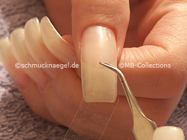 clear adhesive tape, tweezers and cutter