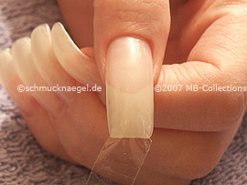 clear adhesive tape, tweezers and cutter
