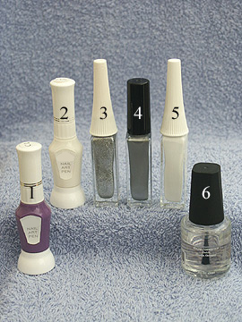 Products for nail decoration in purple look - Nail polish, Nail art pen, Nail art liner, Clear nail polish