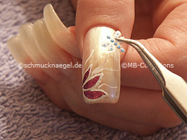 3D nail sticker in the form of a dragonfly or butterfly and the tweezers