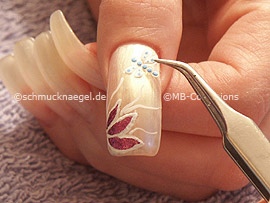 3D nail sticker in the form of a dragonfly or butterfly and the tweezers
