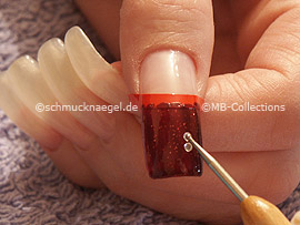 spot-swirl and four strass stones in the colour crystal