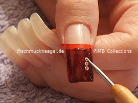spot-swirl and four strass stones in the colour crystal